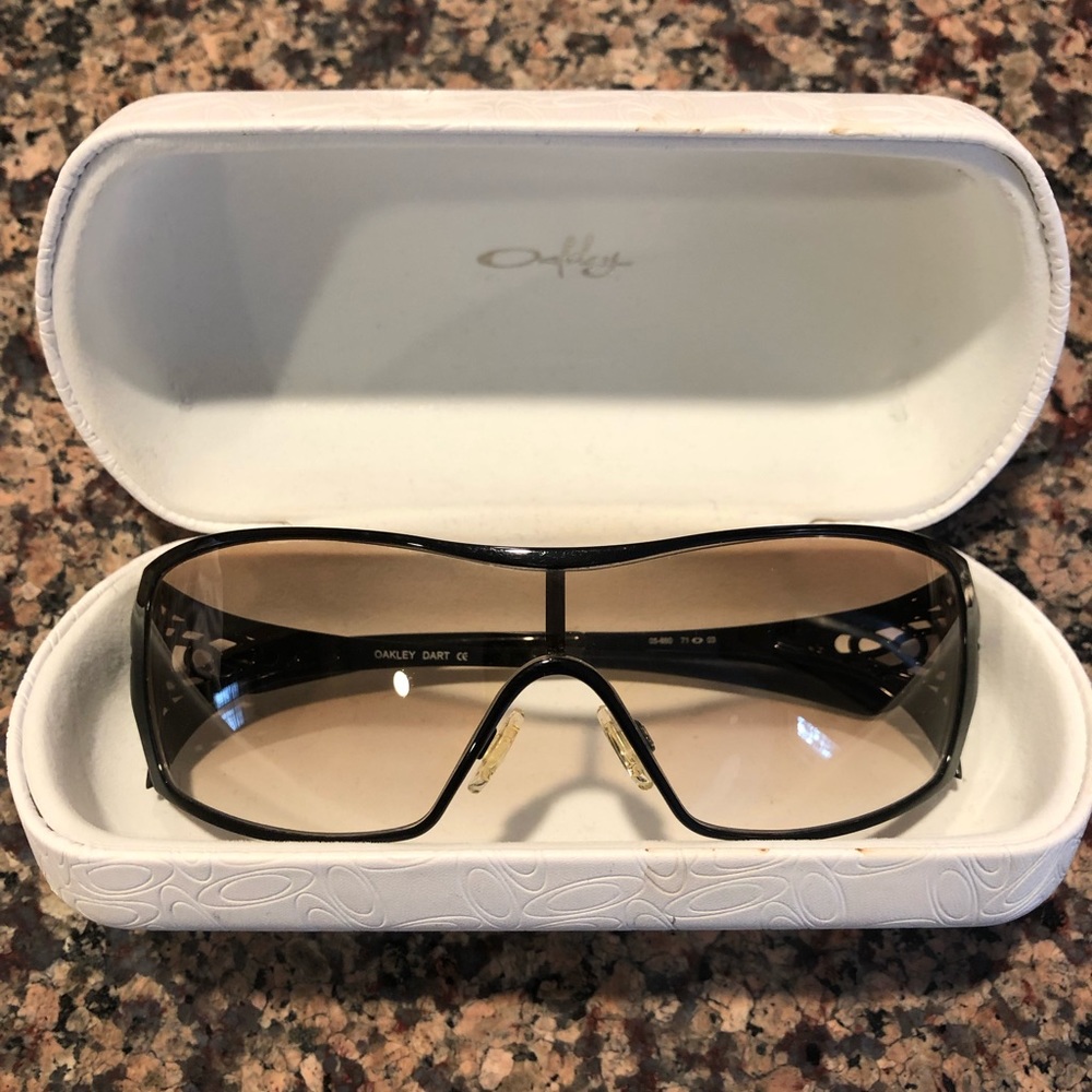 Oakley Dart sunglasses. Black frame with amber lens. Good condition